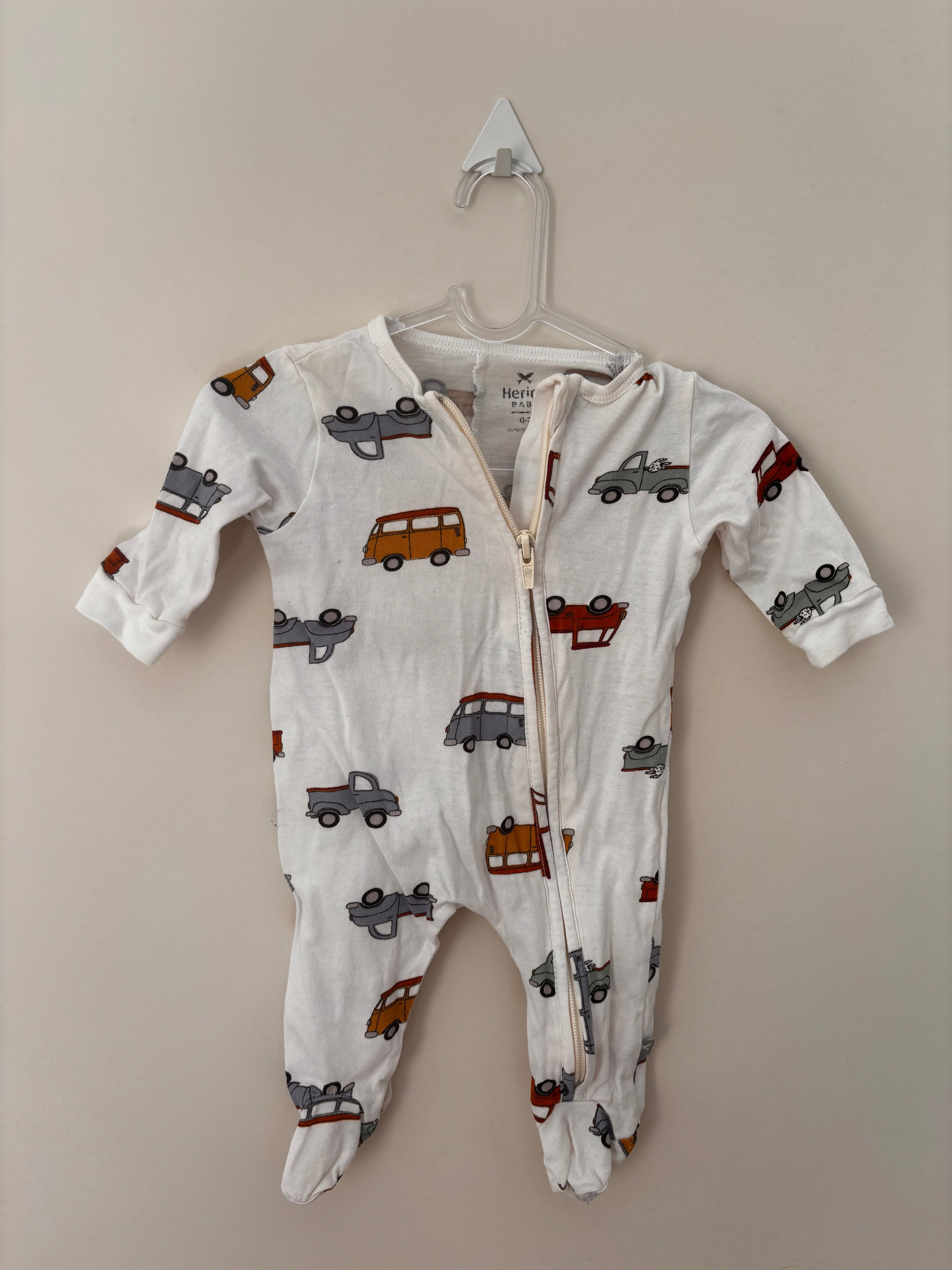Macacão pijama Hering Baby carrinhos branco - frente
